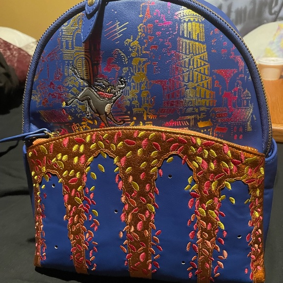 Boxlunch Exclusive - Coco Light Up Marigold Bridge Mini Backpack - Picture 1 of 4